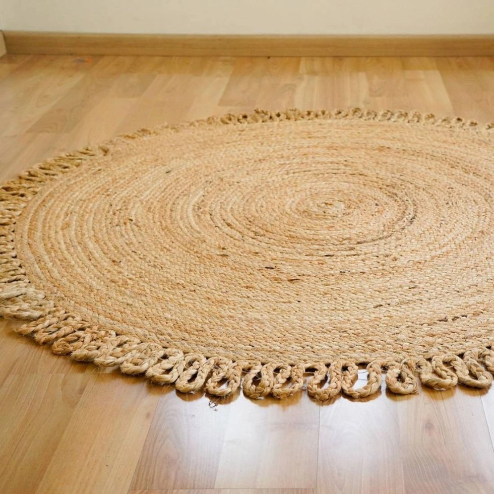 Alfombra redonda de yute con bucles festoneados