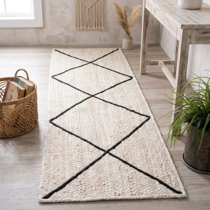 White jute rug with textured black diamond